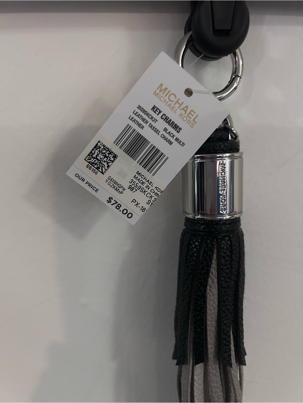 Michael Kors Black and Light Gray Leather Tassel Key Charm with Silver Hardware - Picture 2 of 5